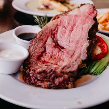 Cafe O'Lei Kihei signature dishes Macadamia Nut Crusted Breast of Chicken
Roast Prime Rib of Beef
Kalua Pork Flatbread